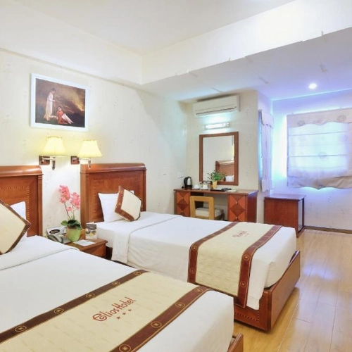 https://avexvietnam.com/wp-content/uploads/2025/09/Elios-hotels-room.webp